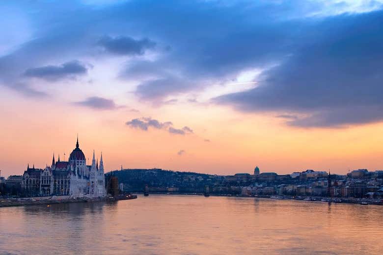 Watch the sunset over the Danube